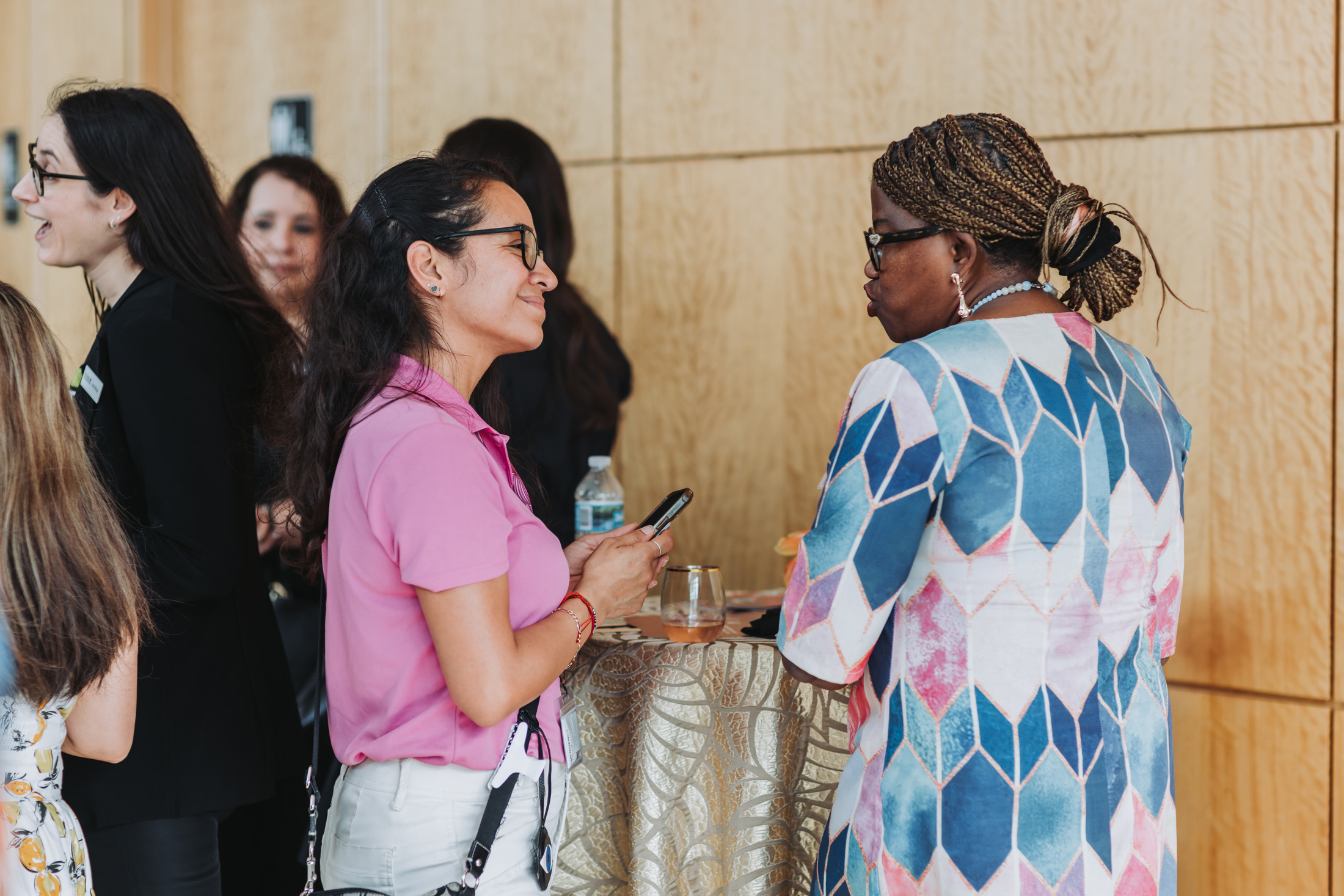 Attendees connect in the lobby
