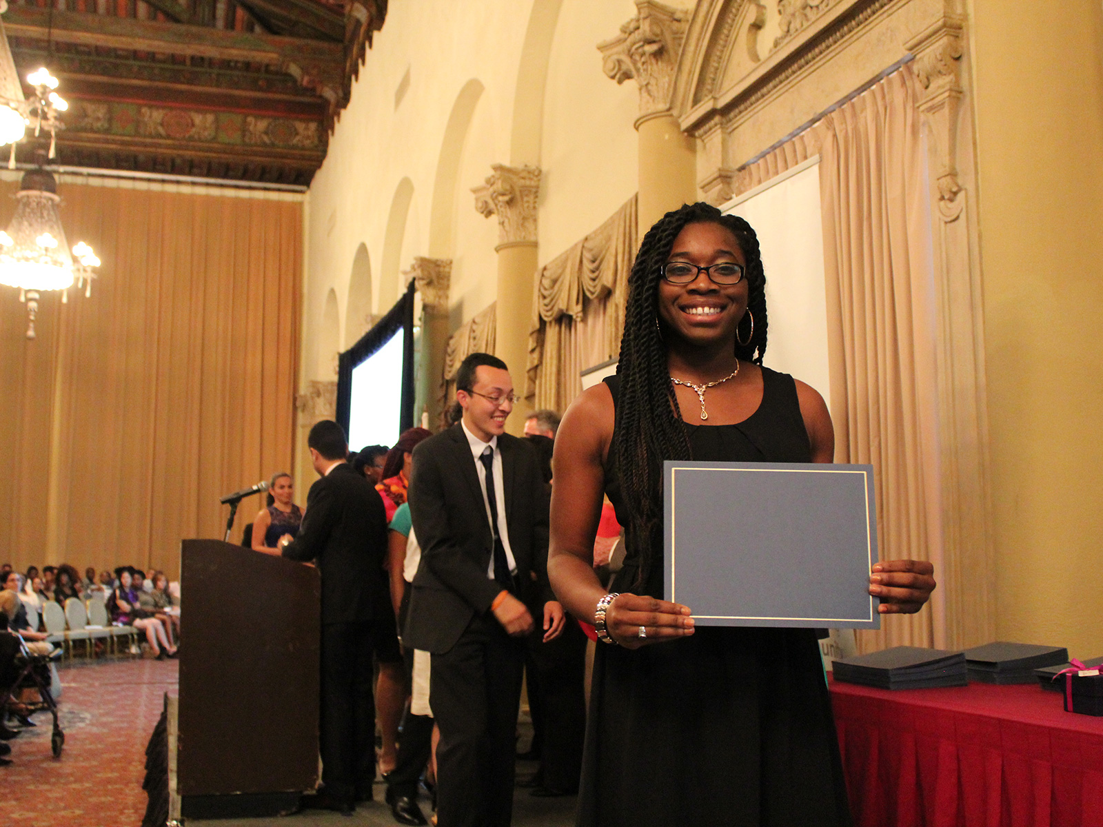 Scholarship student graduating