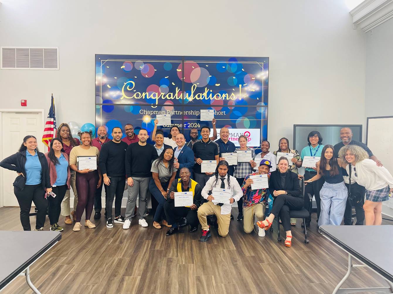 Large celebratory group photo.