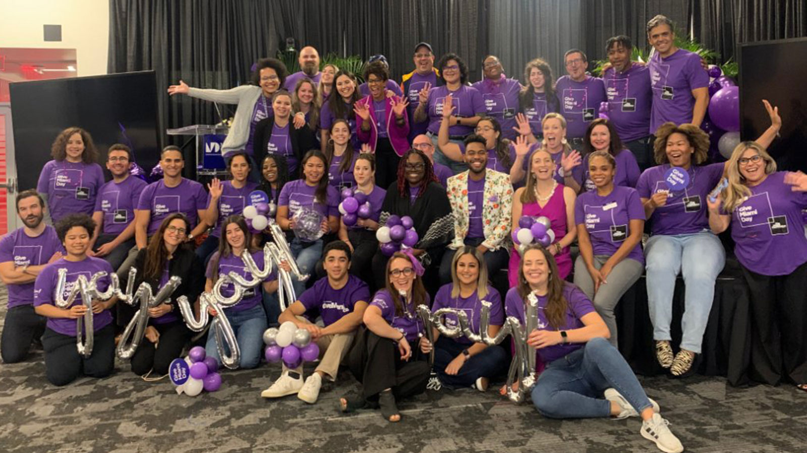 2022 Give Miami Day team smiling together 2022 Give Miami Day team smiling together