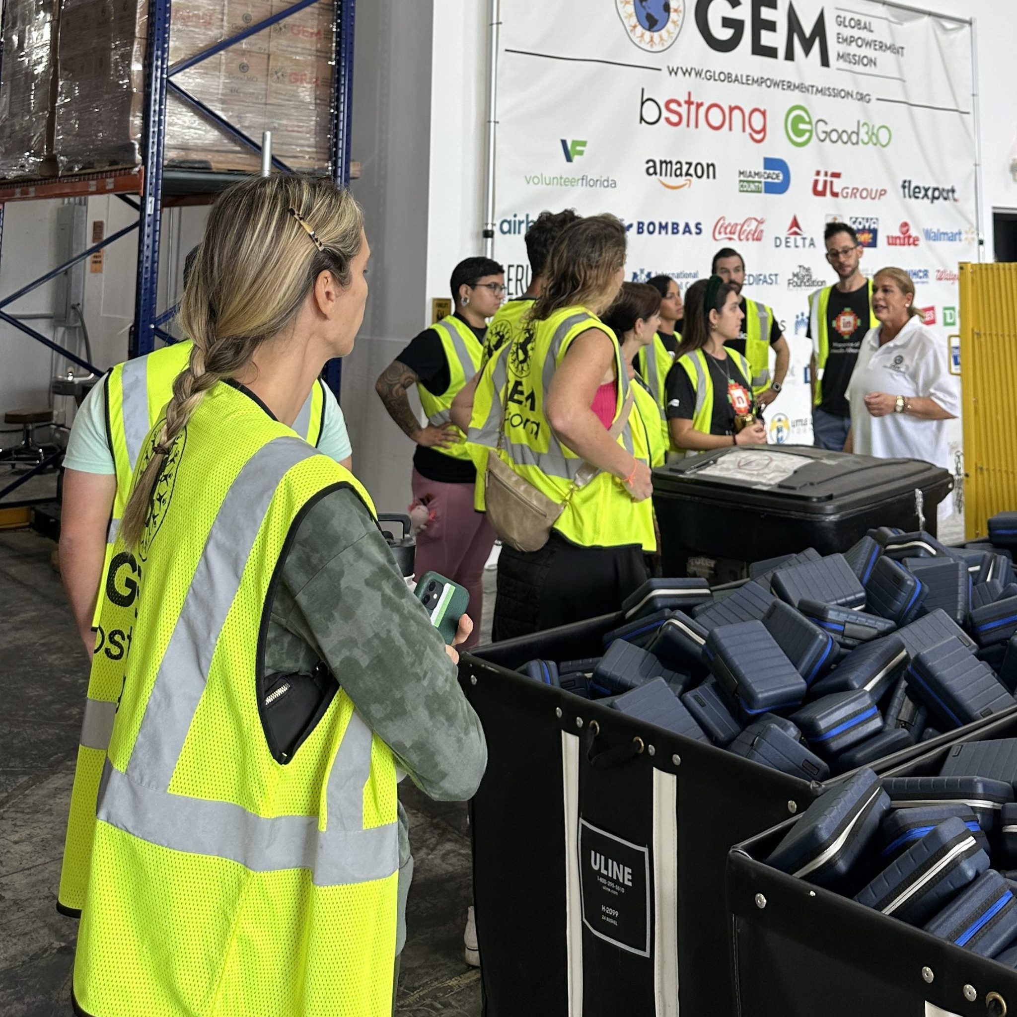 People gathered in neon vests to discuss emergency preparedness