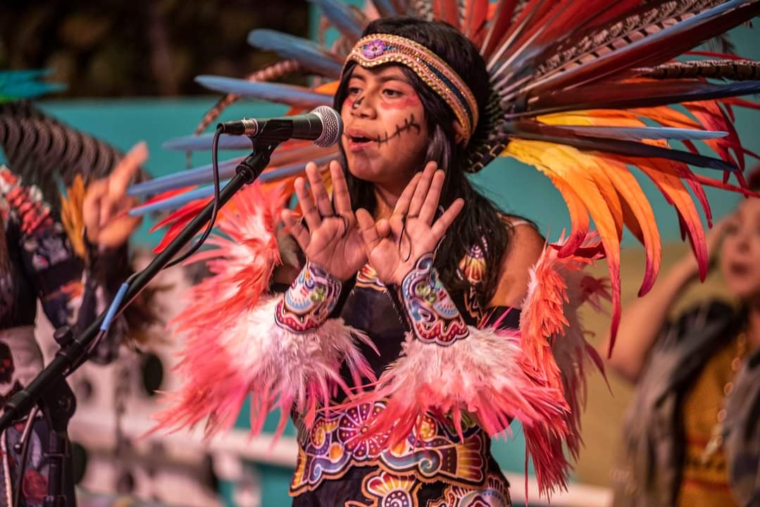 Person at microphone 2024