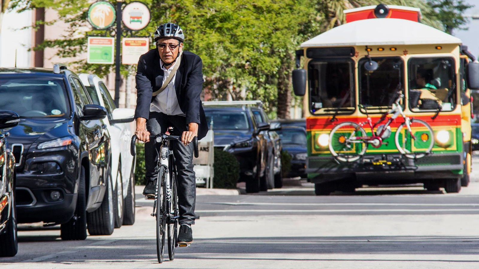 Man on bike on the street | The Miami Foundation