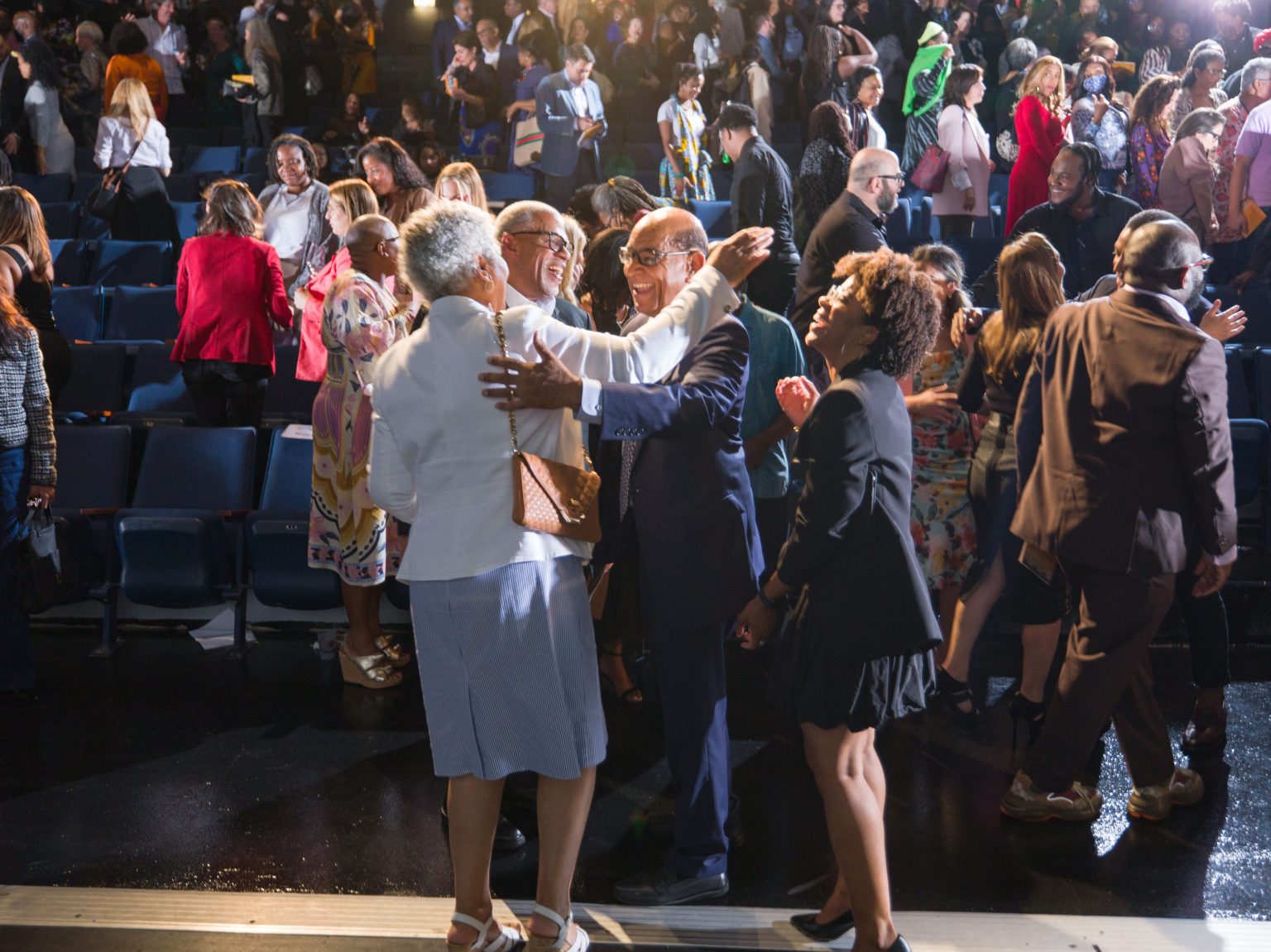 Sheldon Anderson receiving a hug