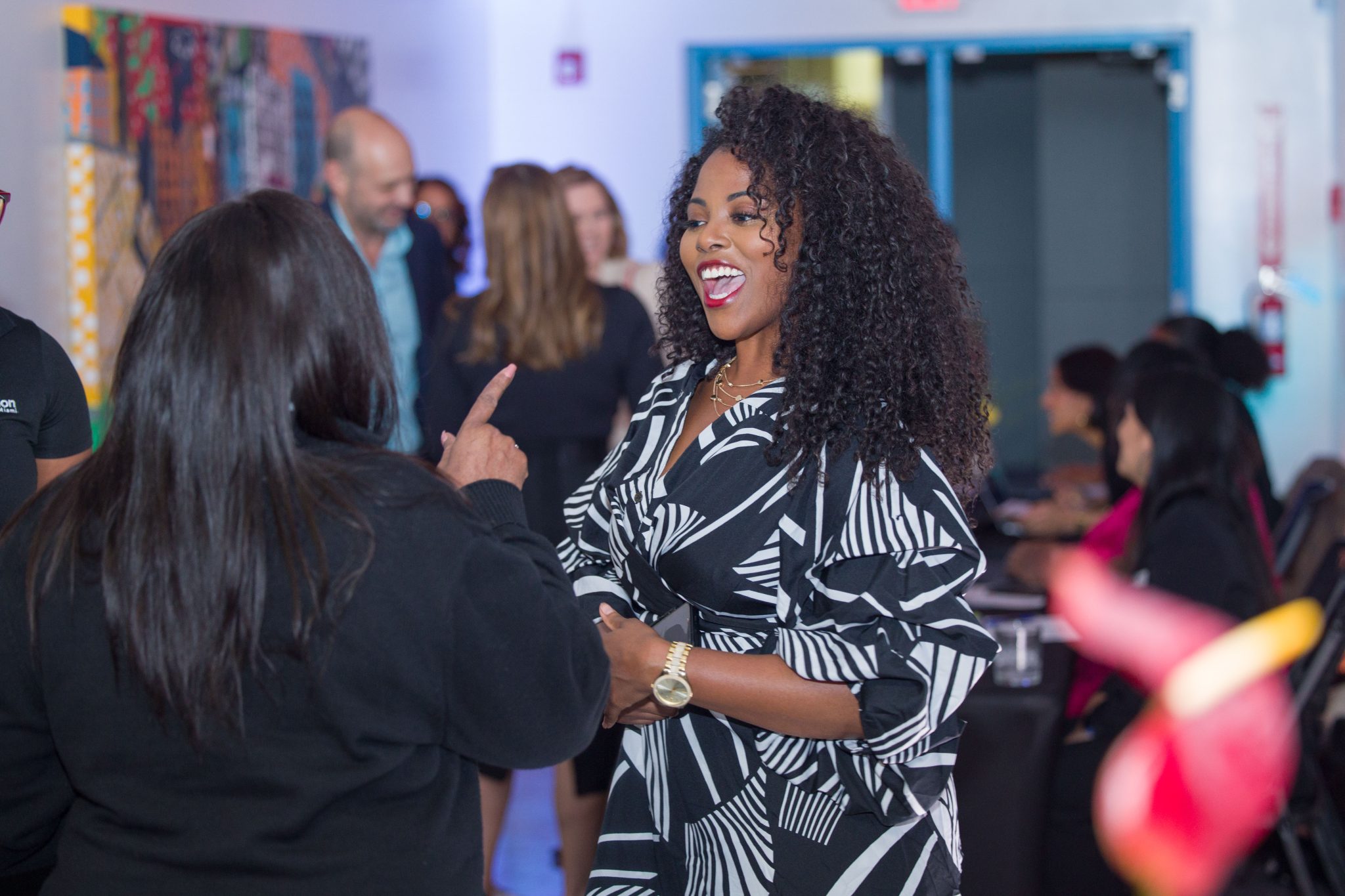 People speaking with one another | 2024 State of Black Philanthropy