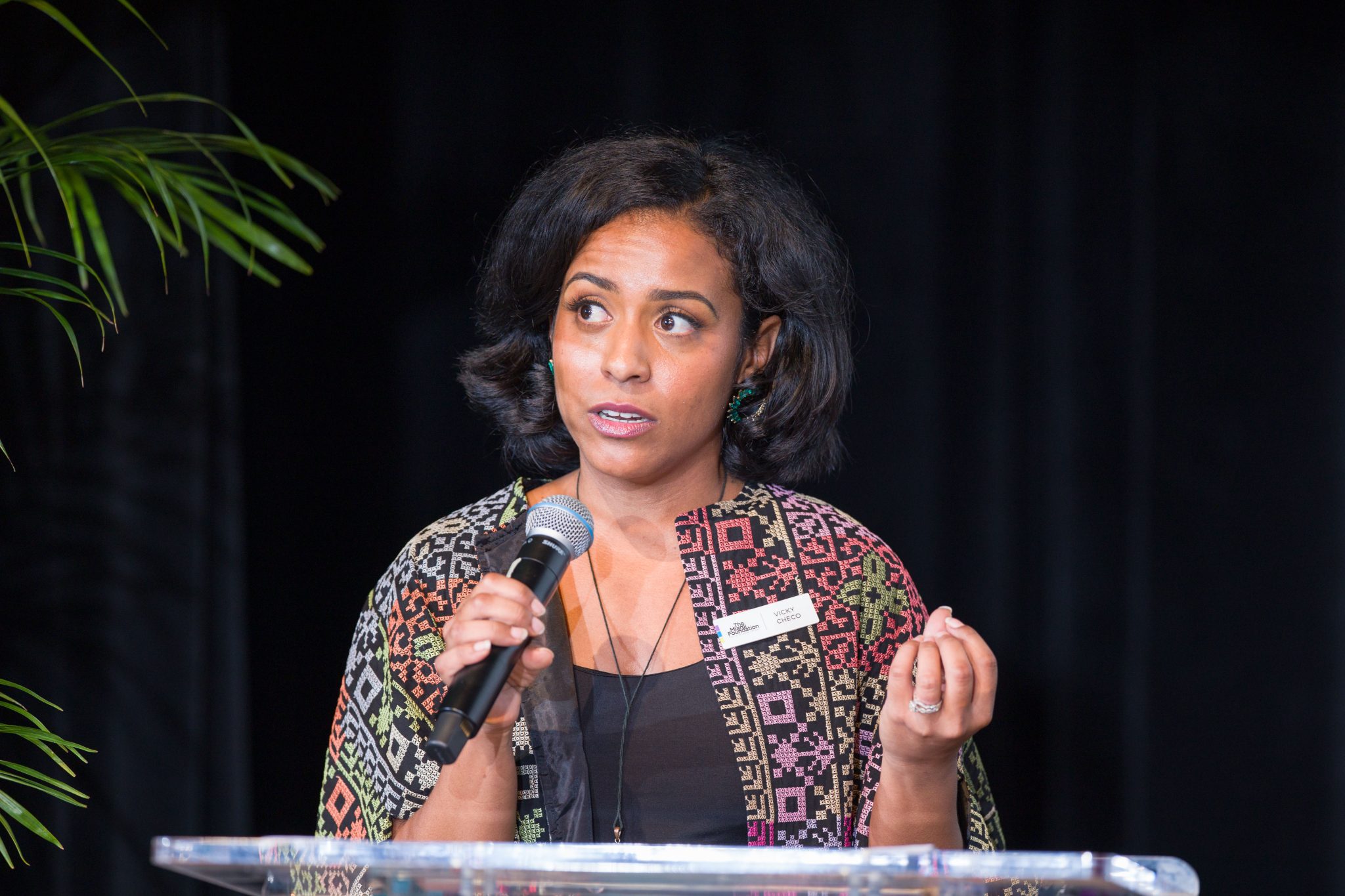 Woman standing with microphone at 2024 State of Black Philanthropy