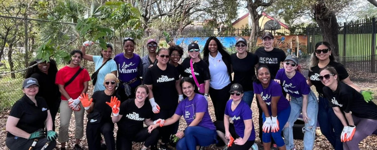 Group of people celebrating national volunteer month
